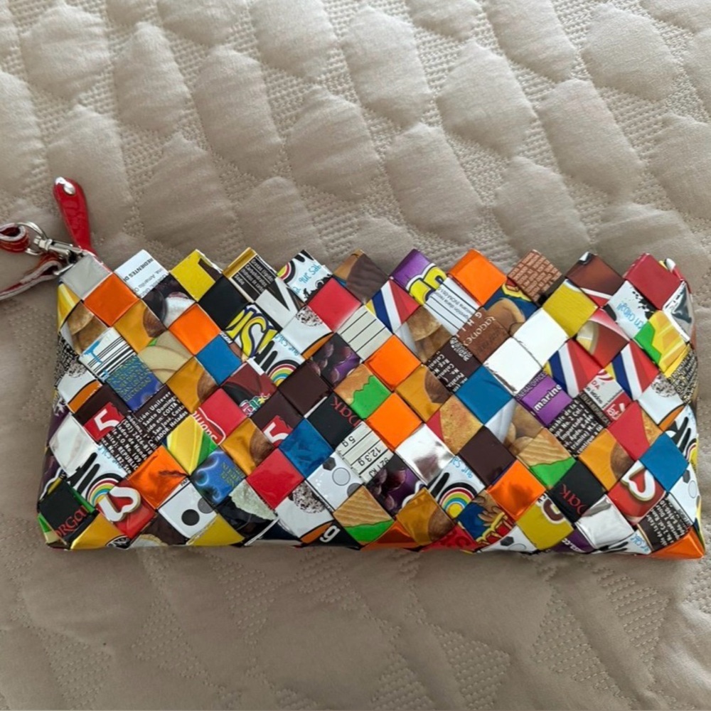 Nahui Ollin Candy Wrapper Clutch with wrist strap
